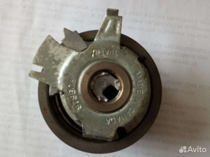 Натяжной ролик