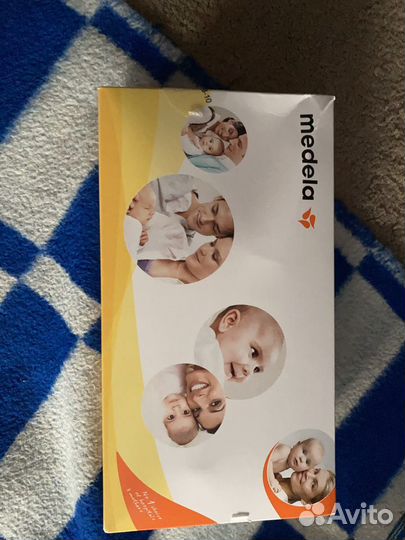 Молокоотсос medela ручной