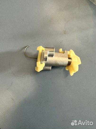 Натяжитель цепи грм