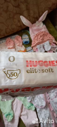 Подгузники и вещи для новорожденного пакетом