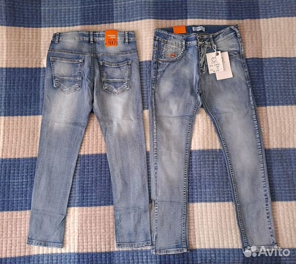 Джинсы новые