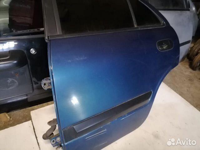 Дверь задняя левая Nissan Almera N16 2001