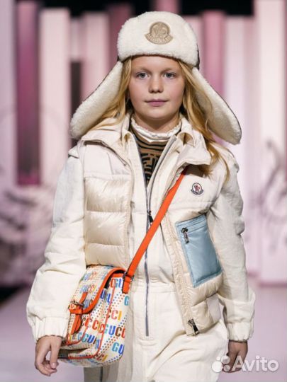 Жилет пуховый