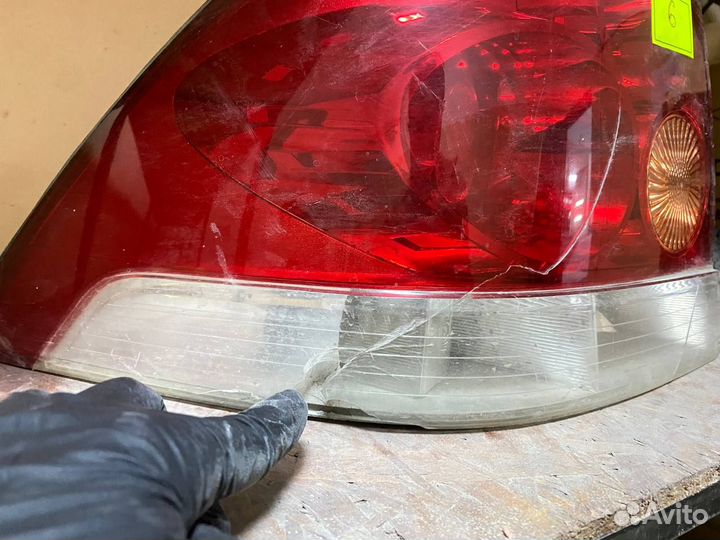 Задний левый фонарь Opel Astra