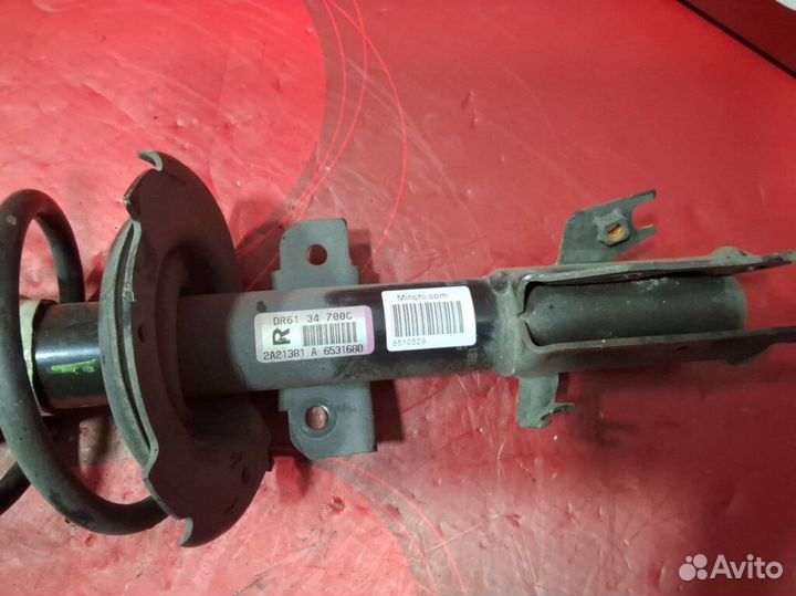 Амортизатор передний правый Mazda Demio DE3FS