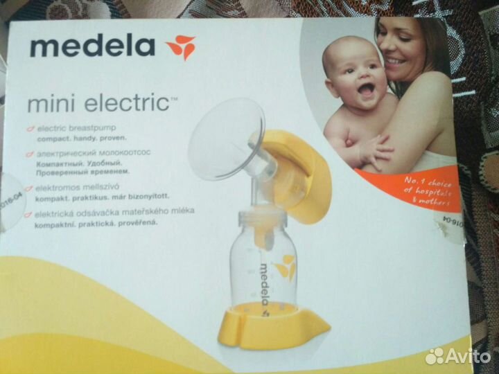 Молокоотсос medela электрический