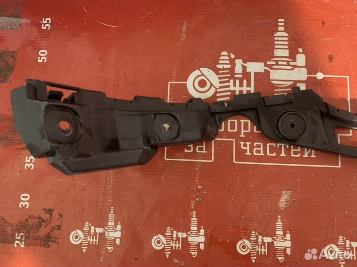 Volkswagen Polo Кронштейн заднего бампера левый