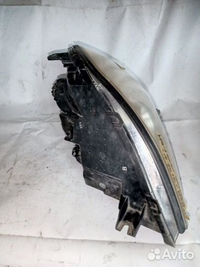 Фара ксеноновая передняя левая Nissan Teana J31