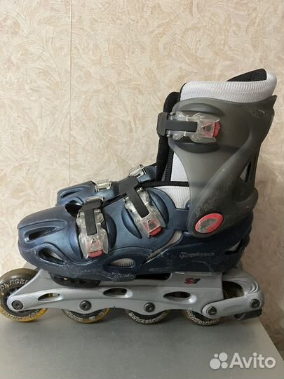 Роликовые коньки