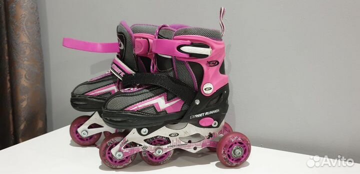 Роликовые коньки