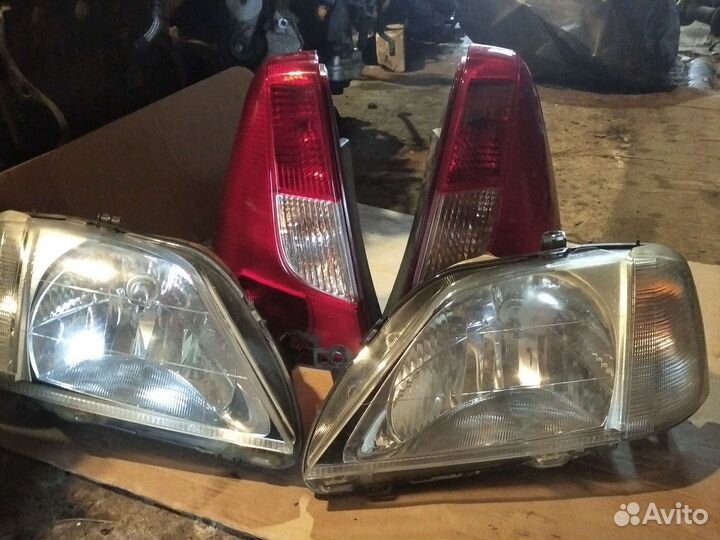 Фары передние и задние фонари Рено Логан 1