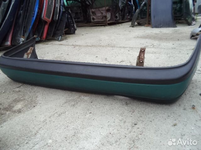 Бампер задний Ниссан Сани