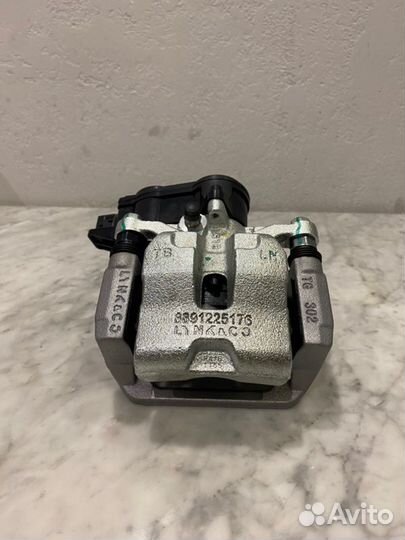 Суппорт тормозной задний левый Geely Monjaro 2021