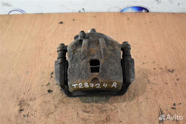 Суппорт тормозной передний правый Hyundai Tucson