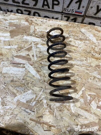 Пружина подвески задняя Mitsubishi Lancer 4G18