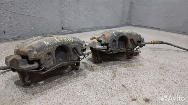 Передний тормозной суппорт 1.4 TSI CAV VW Jetta 6