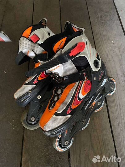 Роликовые коньки