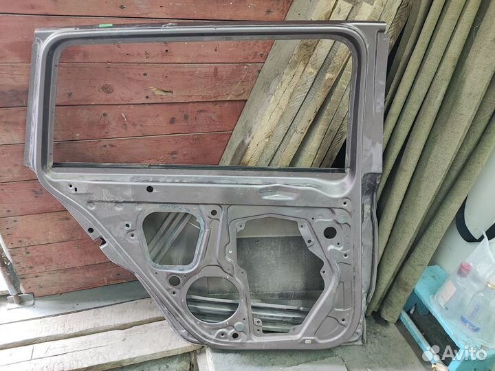Дверь задняя левая superb II рестайл универсал