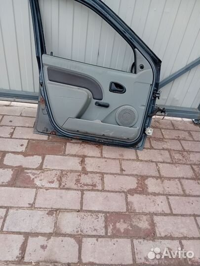 Дверь передняя левая renault logan 1