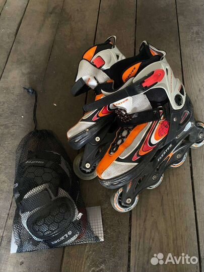 Роликовые коньки