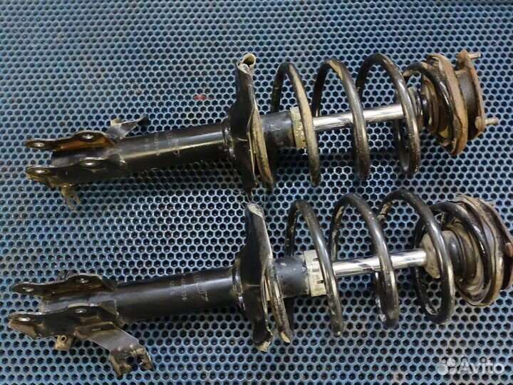 Стойка передняя Nissan Almera N16