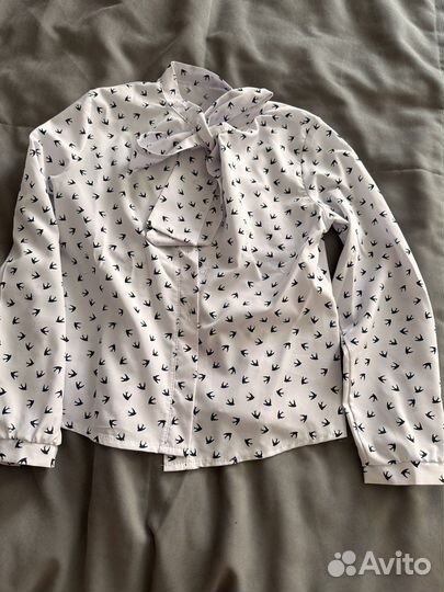 Блузки на девочку 134