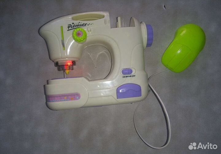 Бизиборд, игрушка швейная машинка