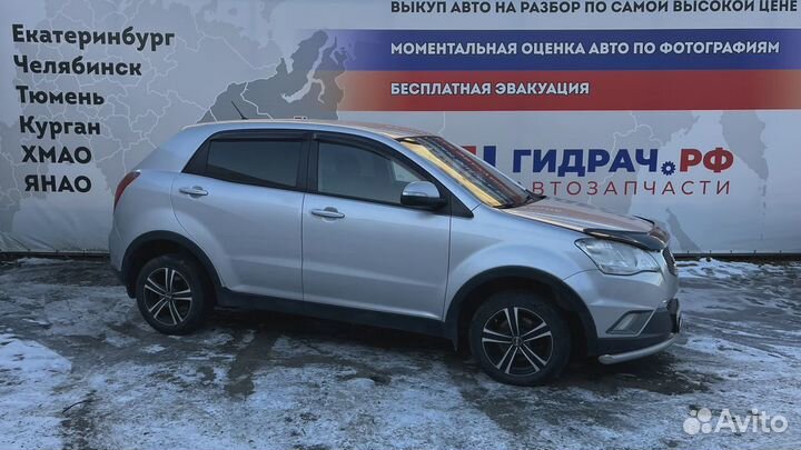 Обшивка багажника левая SsangYong Actyon New 7742334000