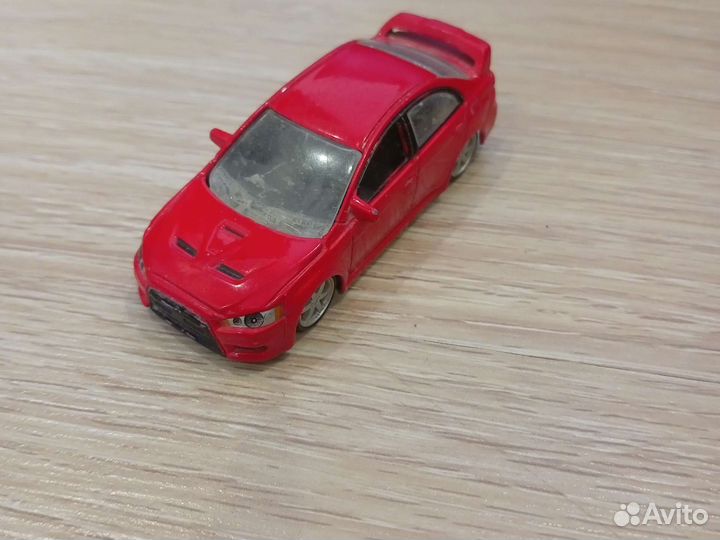 Burago машинка Митсубиси Лансер эволюшен 11317