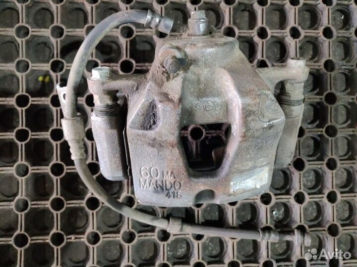 Суппорт тормозной передний левый Genesis G70 седан