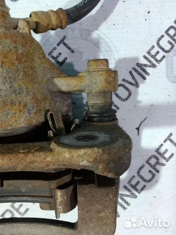 Суппорт тормозной задний Kia Cerato 1