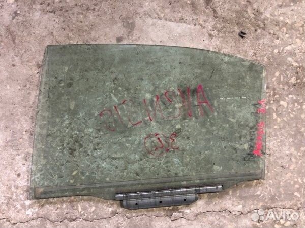 Стекло двери заднее левое Toyota Avensis ZZT251L