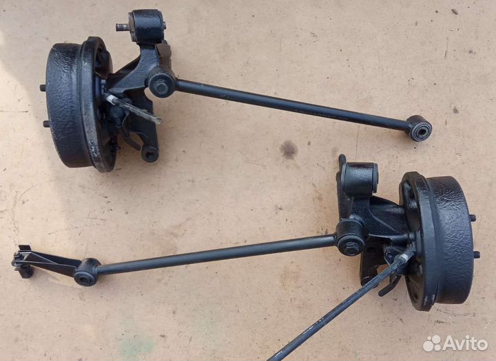 Барабаны кулаки рычаги задние Carina E