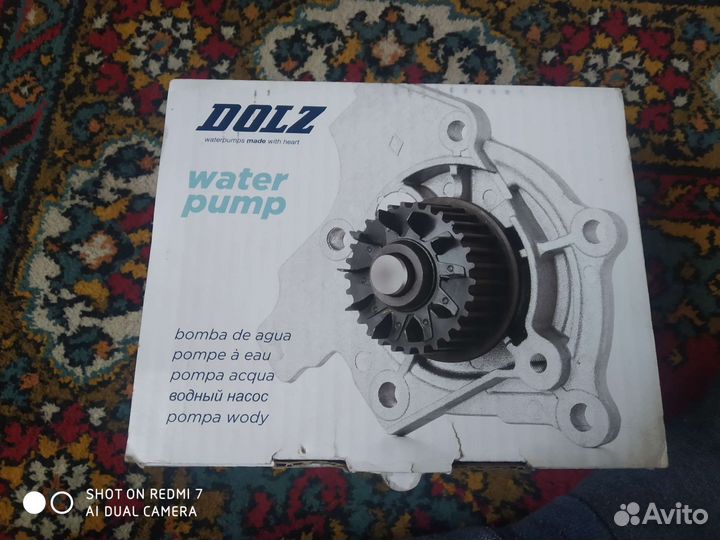 Насос водяной (помпа) для almera n16 QG18. Новая