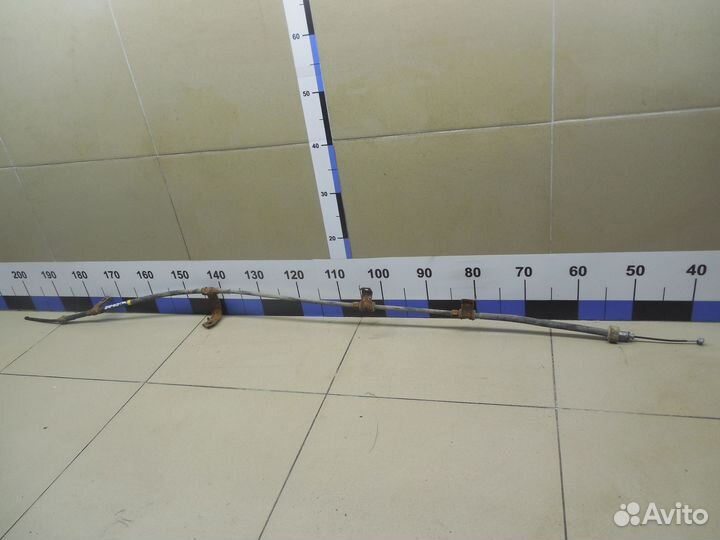 Трос стояночного тормоза правый RIO 2005-2011