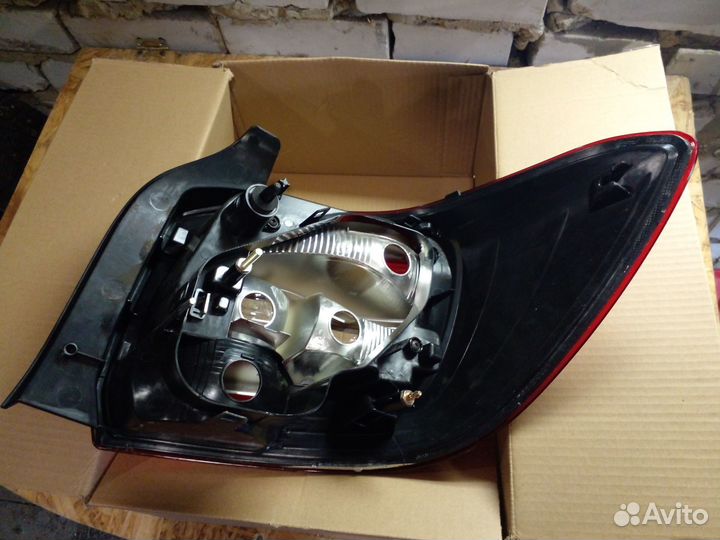 Фонарь левый Renault Logan 2 2014