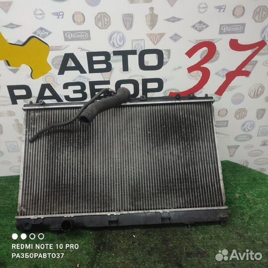 Радиатор охлаждения двигателя Mitsubishi Lancer 9