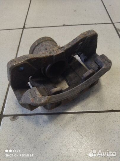 Суппорт тормозной передний левый Daewoo Gentra