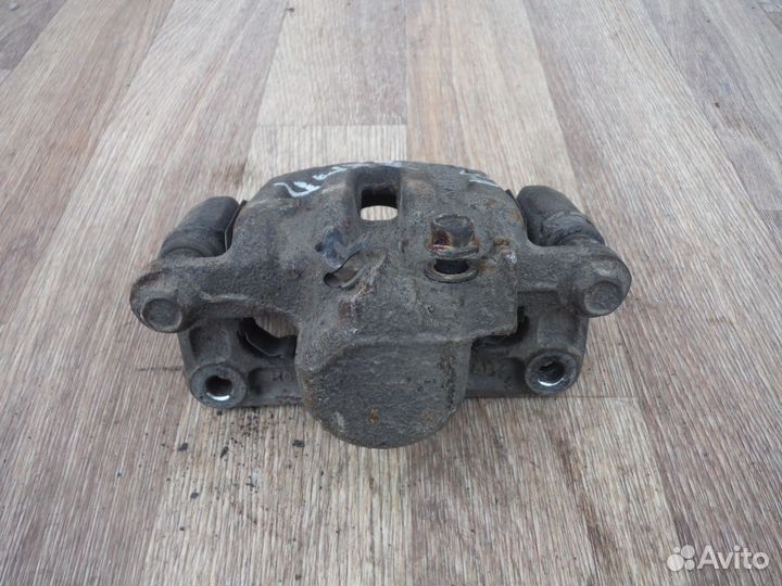 Суппорт тормозной задний левый opel Antara 2009