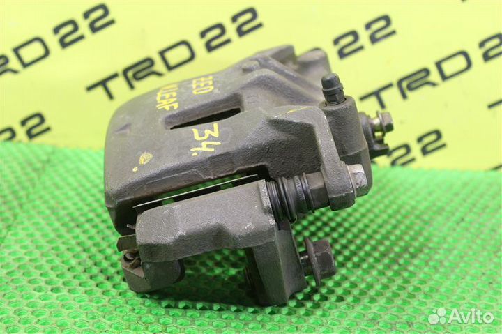 Суппорт тормозной передний левый Nissan Leaf ZE0