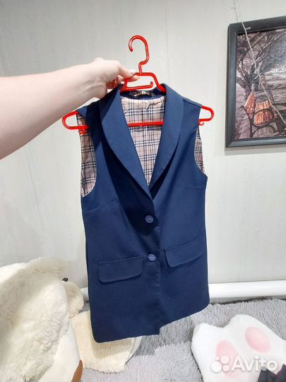 Жилетка женская