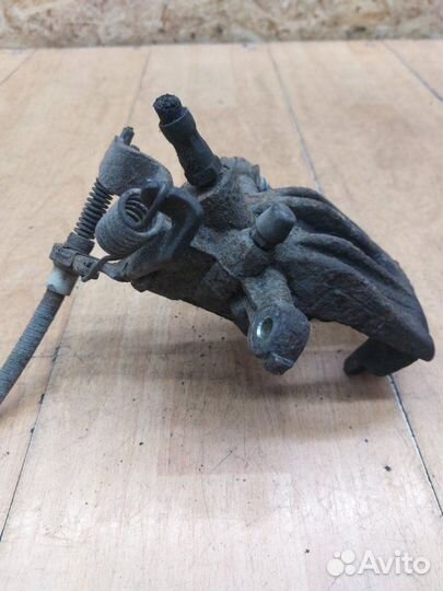 Тормозной суппорт задний левый Ford Mondeo cjba