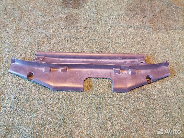 Накладка замка капота 61874AV600 Nissan Primera P1