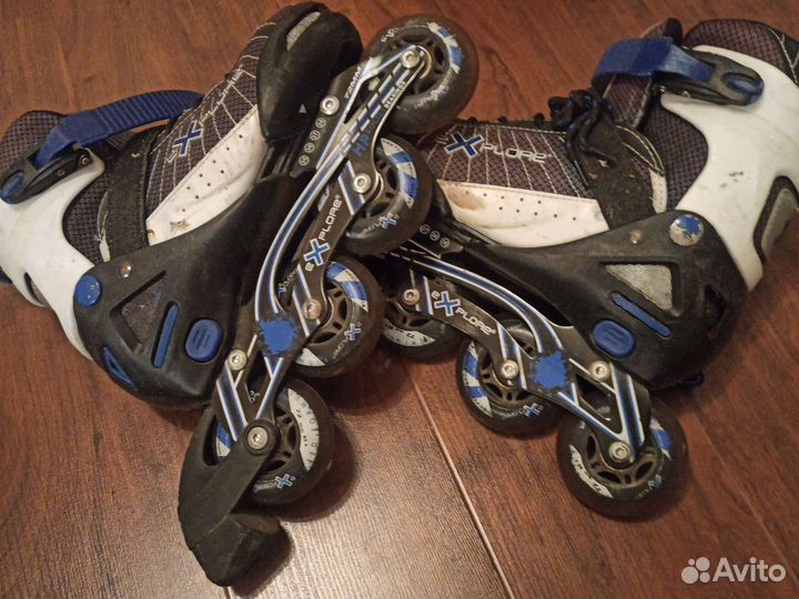 Роликовые коньки