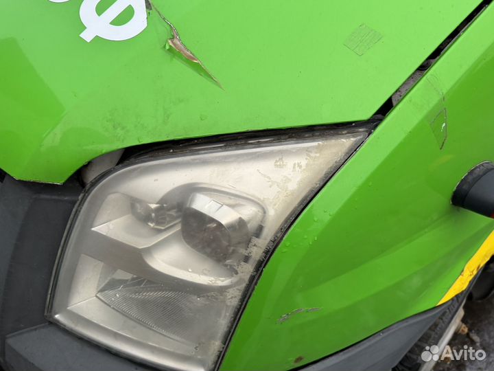 Фара левая Ford Transit 2008г TT9