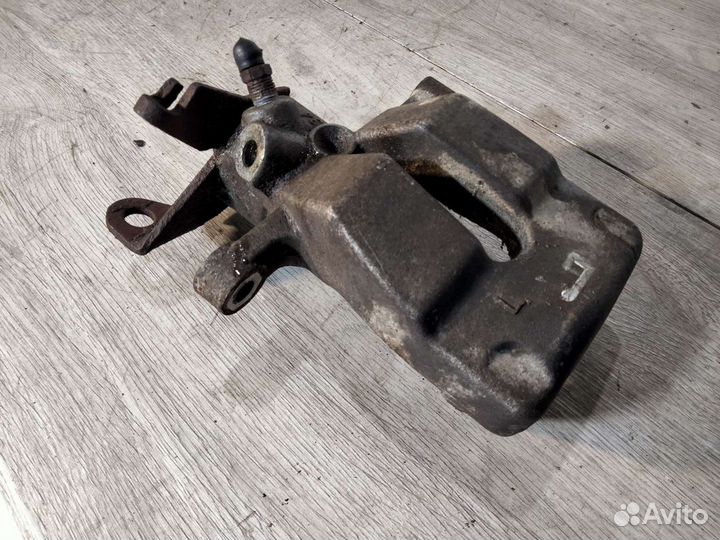 Суппорт задний левый Рено Меган 2