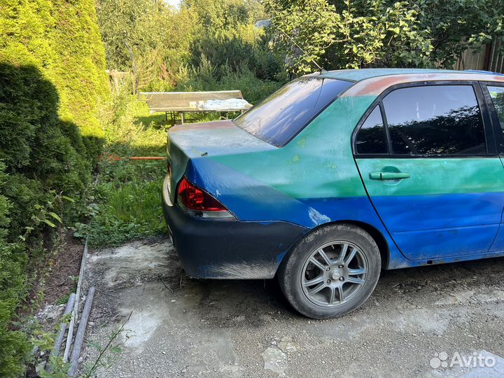 Mitsubishi Lancer 1.6 AT, 2004, битый, 303 013 км