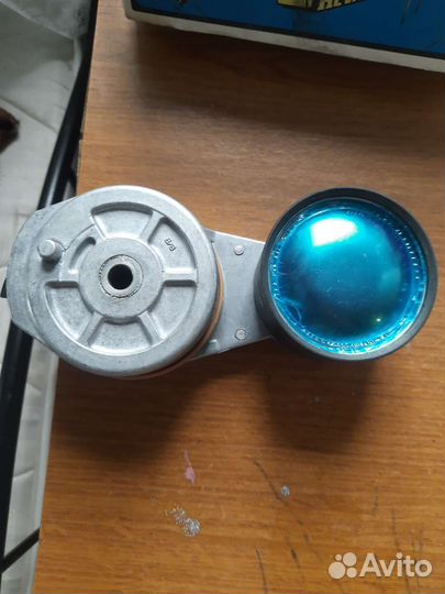 Натяжитель ремня генератора)