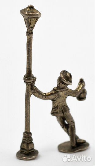 Статуэтка гуляки Серебро Описание