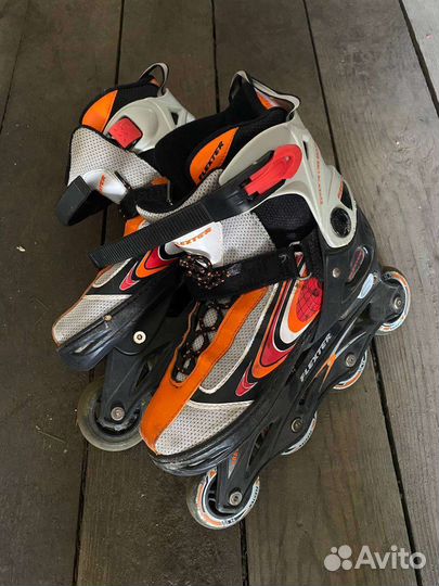 Роликовые коньки